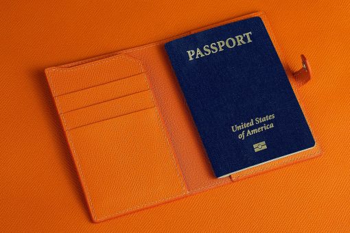 Elevate your travel style with a personalized leather passport wallet. Premium full-grain leather with over 30 color options. Holds passport + cards. Handmade to last.