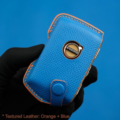 Elevate your Volvo driving experience with our handmade leather key fob cover. Choose from 30+ colors to match your style. Personalize with name, number, or logo.