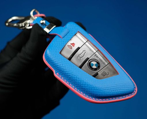 BMW Series Customizable Leather Key Fob Case. Personalized full grain leather cover for your BMW key fob with your choice of color, stamped initials or logo from LeatherSwift.com.