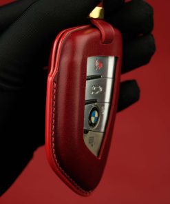 BMW Series Customizable Leather Key Fob Case. Personalized full grain leather cover for your BMW key fob with your choice of color, stamped initials or logo from LeatherSwift.com