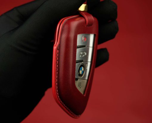 BMW Series Customizable Leather Key Fob Case. Personalized full grain leather cover for your BMW key fob with your choice of color, stamped initials or logo from LeatherSwift.com