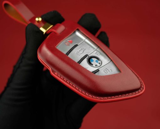 BMW Series Customizable Leather Key Fob Case. Personalized full grain leather cover for your BMW key fob with your choice of color, stamped initials or logo from LeatherSwift.com