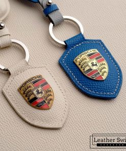 Customizable leather key fob case for Porsche Cayenne, Macan, Panamera, and 911 models, handmade with premium full grain leather by Leatherswift.