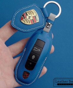 Customizable leather key fob case for Porsche Cayenne, Macan, Panamera, and 911 models, handmade with premium full grain leather by Leatherswift.