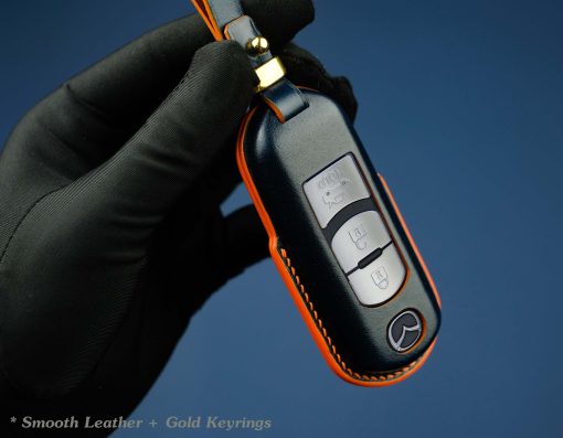 Customizable full-grain leather key fob case for Mazda with personalized embossing option in various colors, handmade by LeatherSwift.Com