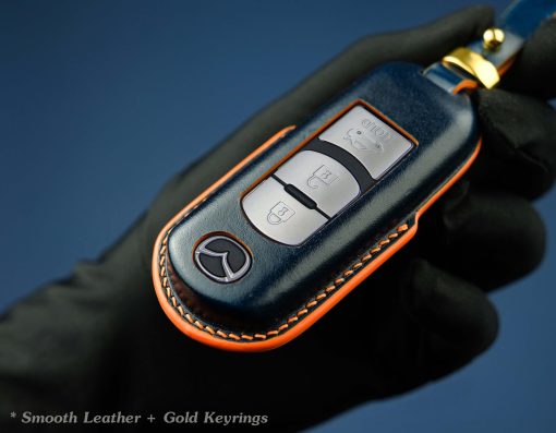 Customizable full-grain leather key fob case for Mazda with personalized embossing option in various colors, handmade by LeatherSwift