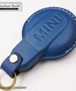 Customizable leather key fob case for Mini Cooper by LeatherSwift, handmade with premium full-grain leather in over 30 colors, personalized with a name, phone number, or logo.