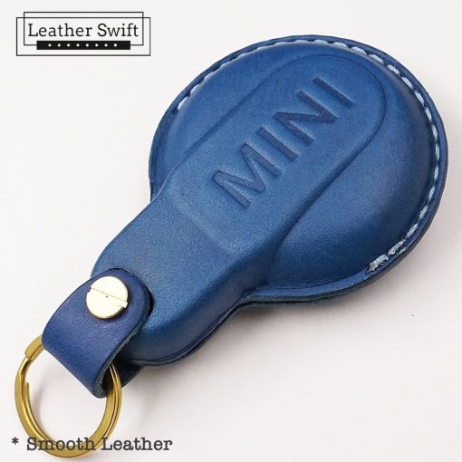 Customizable leather key fob case for Mini Cooper by LeatherSwift, handmade with premium full-grain leather in over 30 colors, personalized with a name, phone number, or logo.