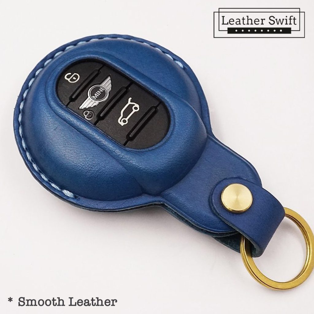 Customizable leather key fob case for Mini Cooper by LeatherSwift, handmade with premium full-grain leather in over 30 colors, personalized with a name, phone number, or logo.