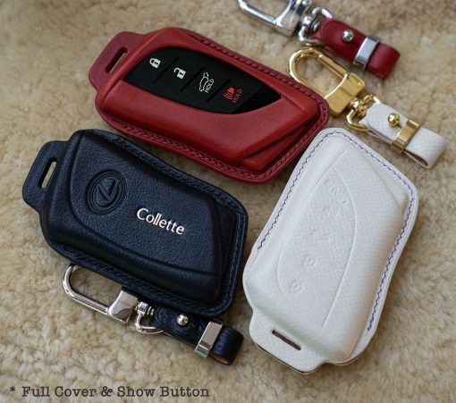 A collection of colorful Lexus leather key cases in various finishes, showcasing the personalization options available at Leather Swift.